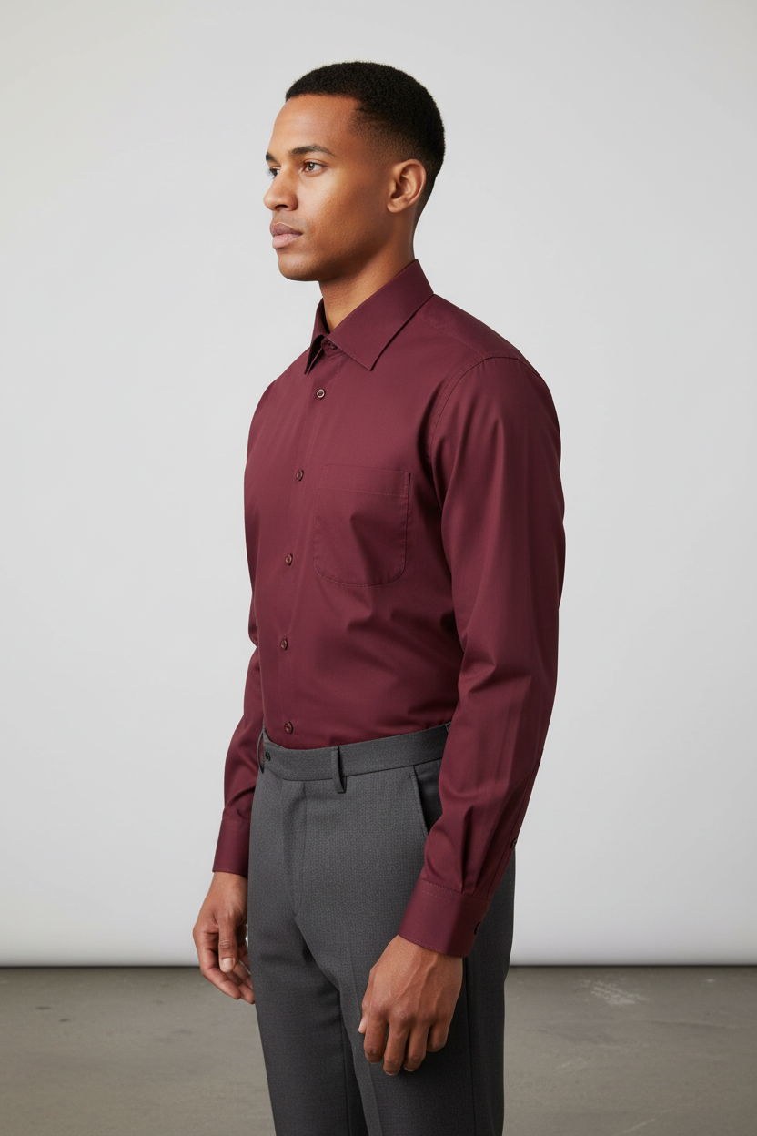 Adult male model wearing the Burgundy long sleeve dress shirt in side profile