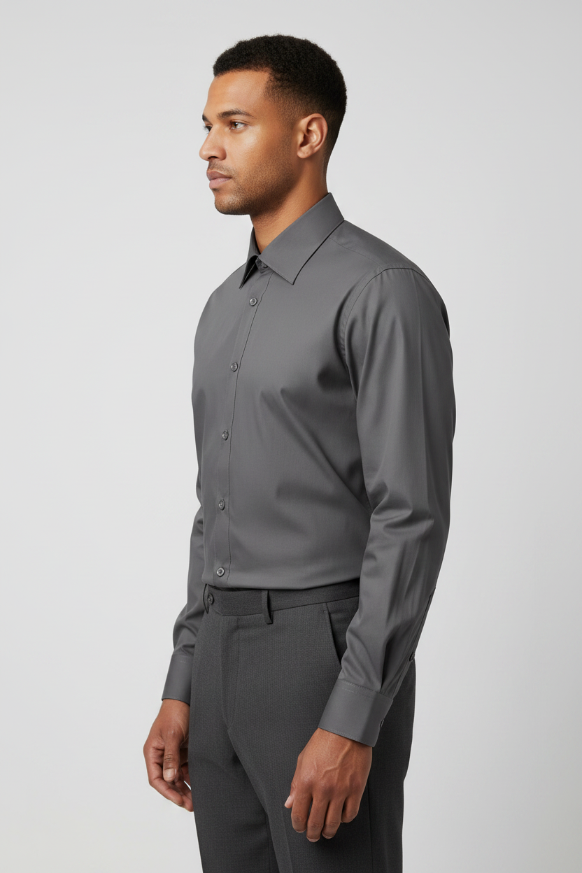 Adult male model wearing the Dark Gray long sleeve dress shirt in side profile